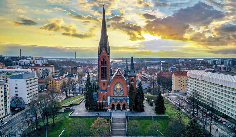 Majestic St. Michael's Church and the surrounding Portsa neighborhood in Turku. 
