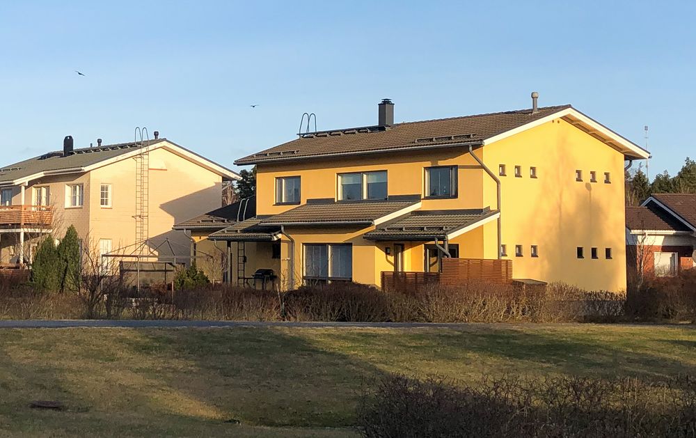 Yellow house in the sun set in Kaarina in the neighborhood of Kesämäki