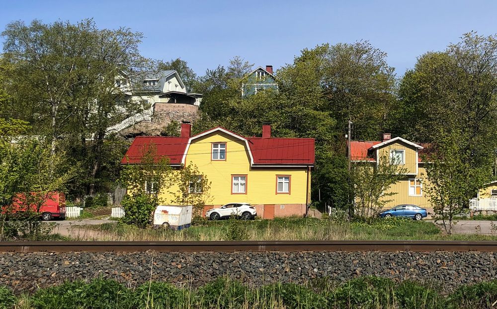 Wooden houses on a hill by the railroad in Turku in the neighbourhood of Raunistula.